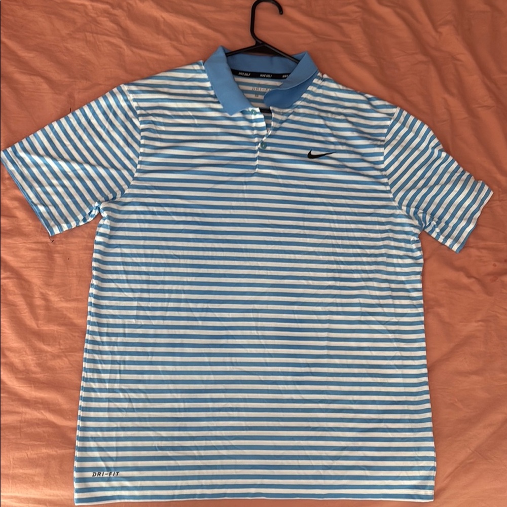 Nike Men's Blue Striped Polo Shirt